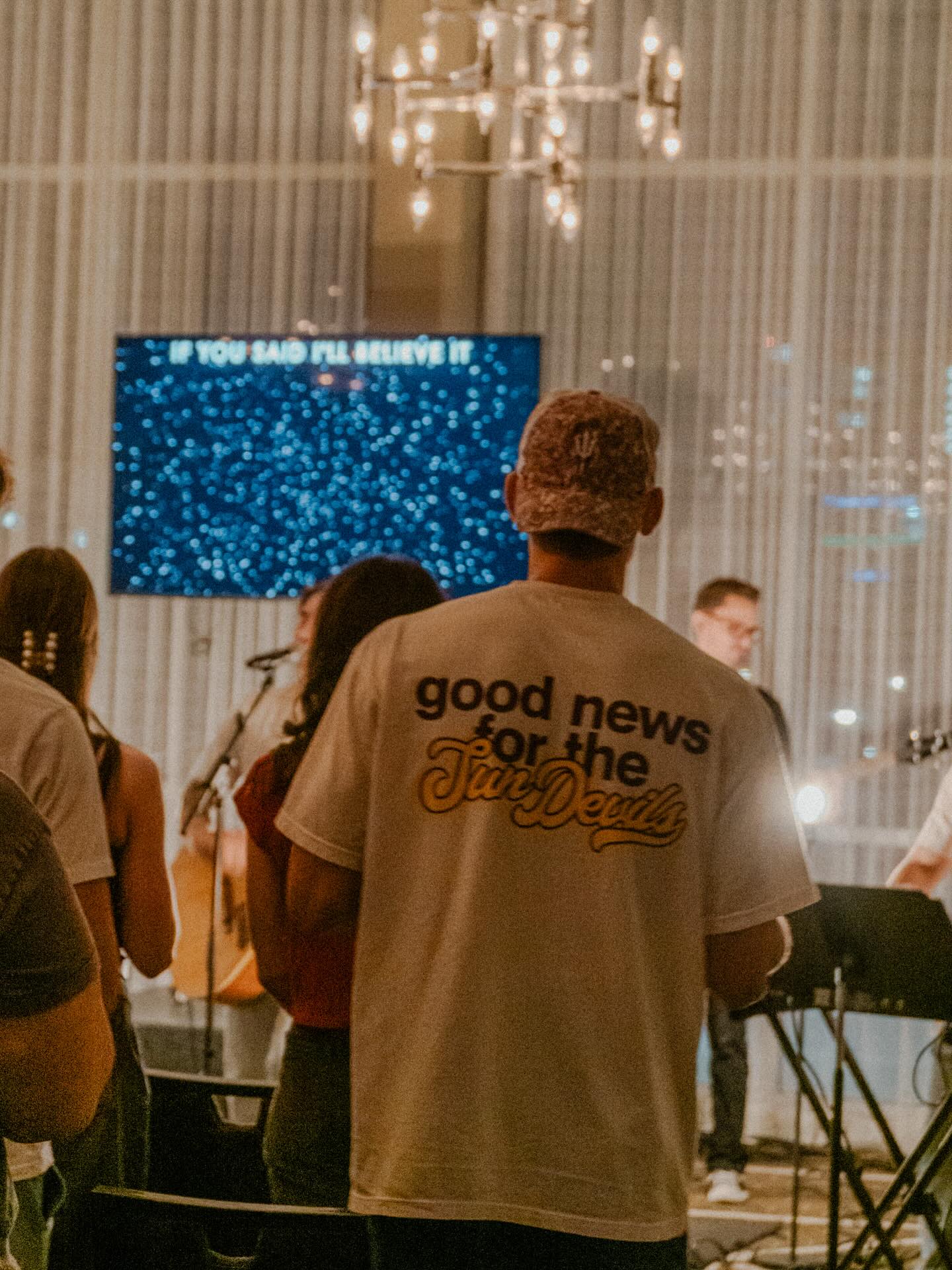 Preston wearing Arizona State University shirt