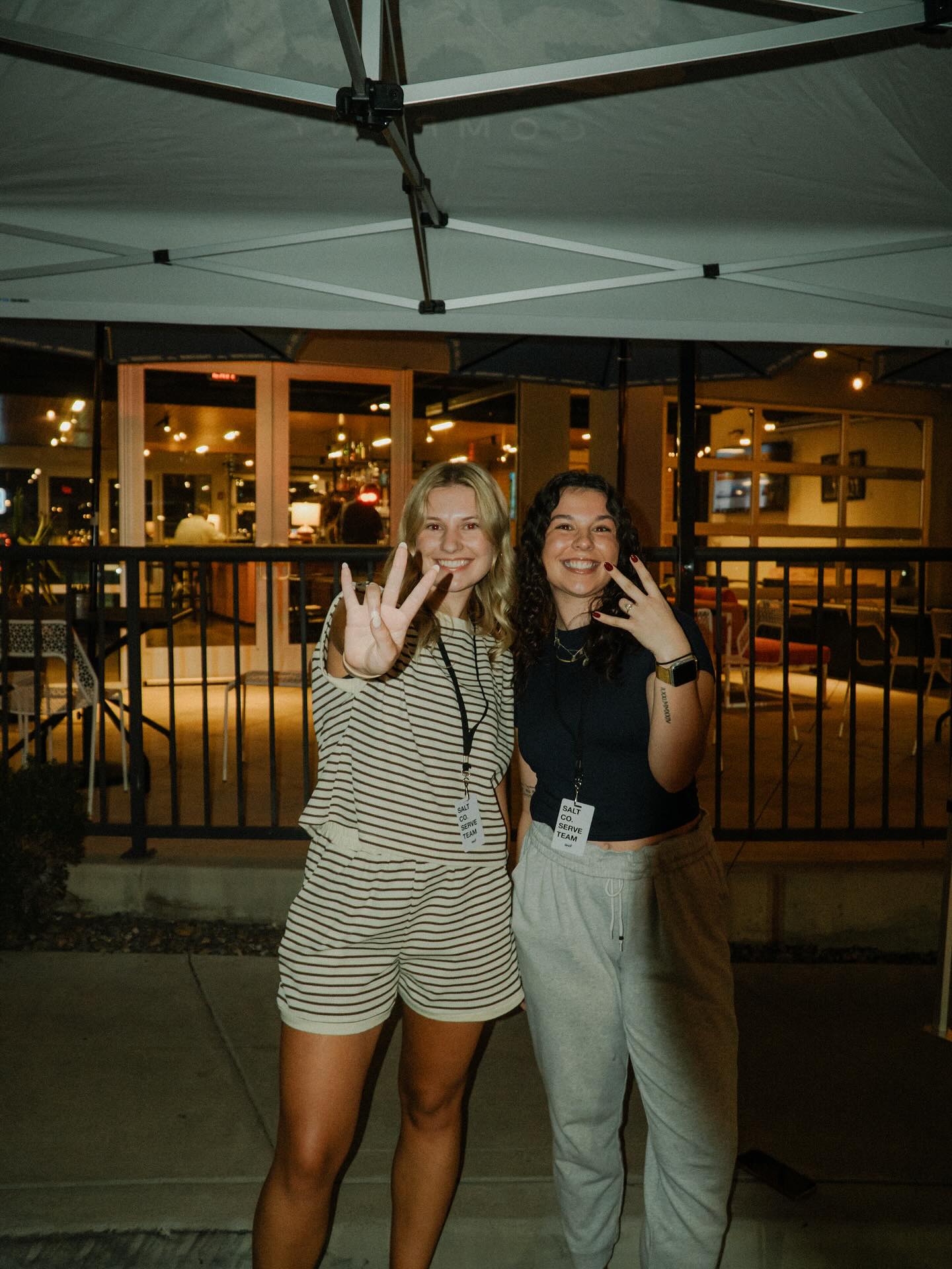 Salt Company members making forks up gesture